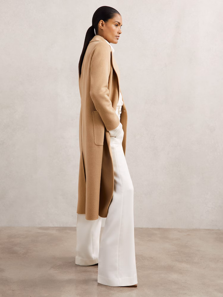 Best Winter Coats for Women Over 40: 7 Coats Worth Buying in 2025 10 winter coats for women showing a woman wearing a knee length coat in camel