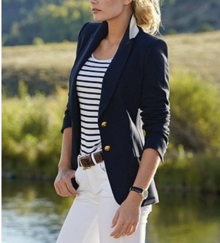 parisian style, ways to style a navy blazer, outfit ideas for spring, woman wearing a striped tee, navy blazer, white denim and belt