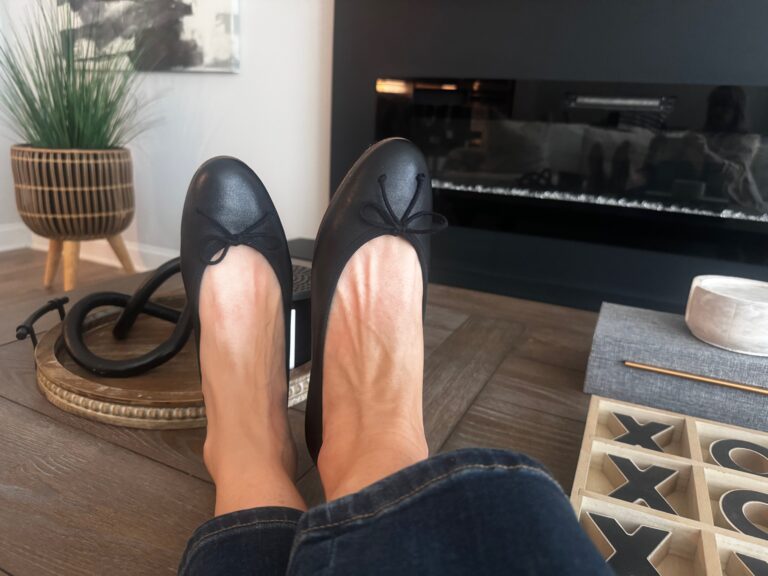best walking shoes, woman wearing a pair of black margaux dei ballet flats