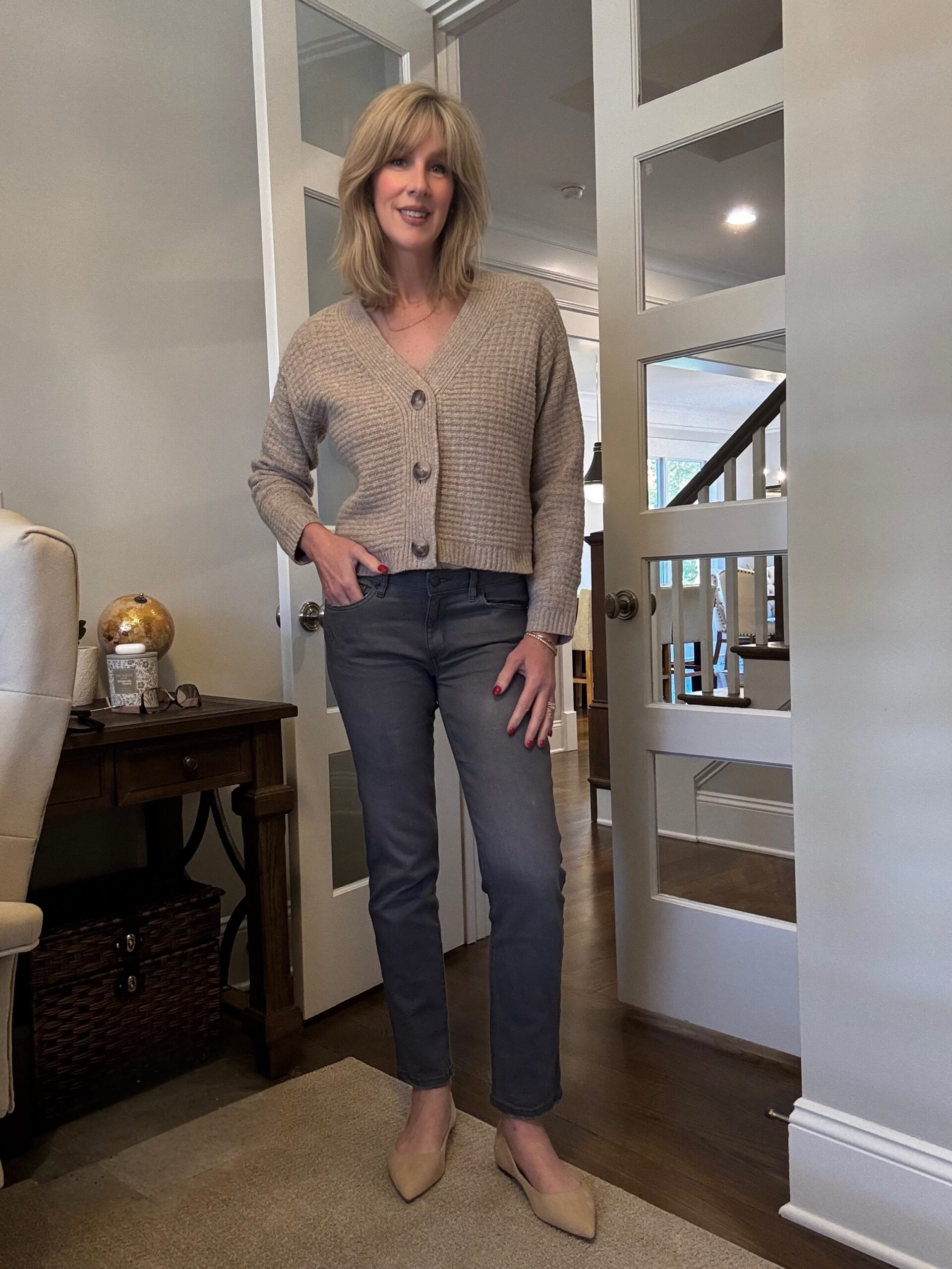 style tip showing a woman matching necklines to elongate the body.